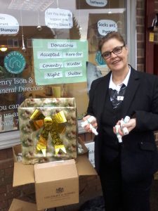 Kim Skerrett with the collection boxes at Henry Ison