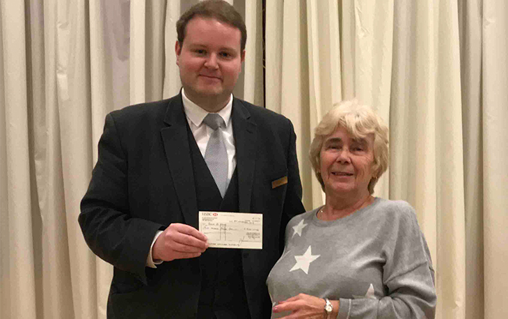 A N Abraham Funeral Directors donate £500 to local charity