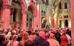 A bunch of people at an event inside Belfast Cathedral.