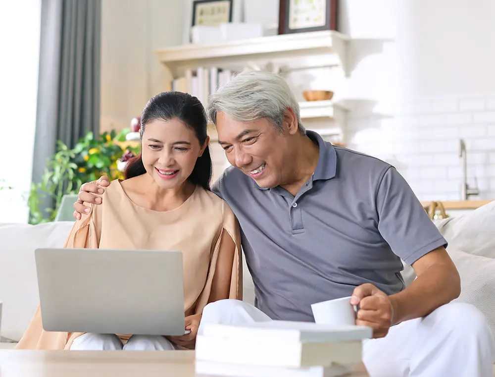 Choice couple at a laptop