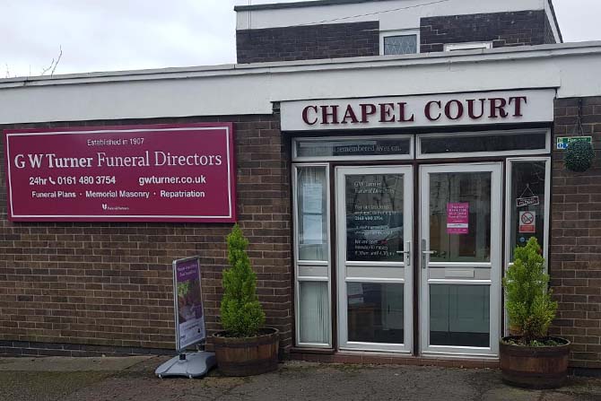 Entrance to G W Turner Funeral Director with branded signs