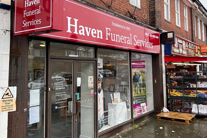 Front of Haven Funeral Services in Acton showing red signage