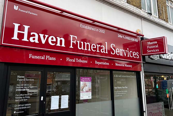 Front of Haven Funeral Services in Northwood Hills showing red signage